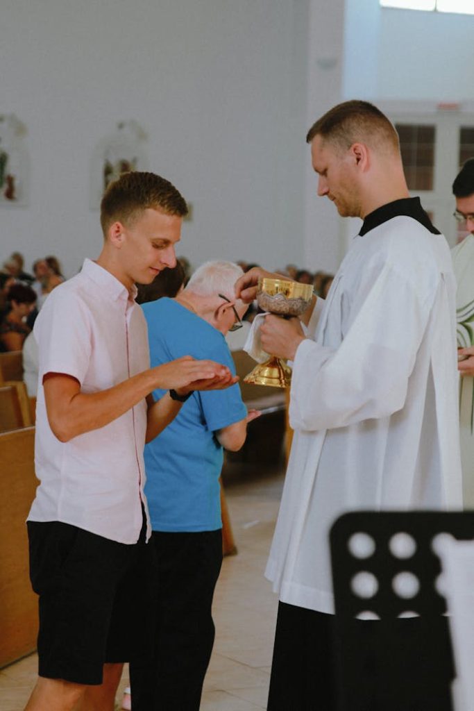 a-man-receiving-the-holy-communion-13408949 A Man Receiving the Holy Communion